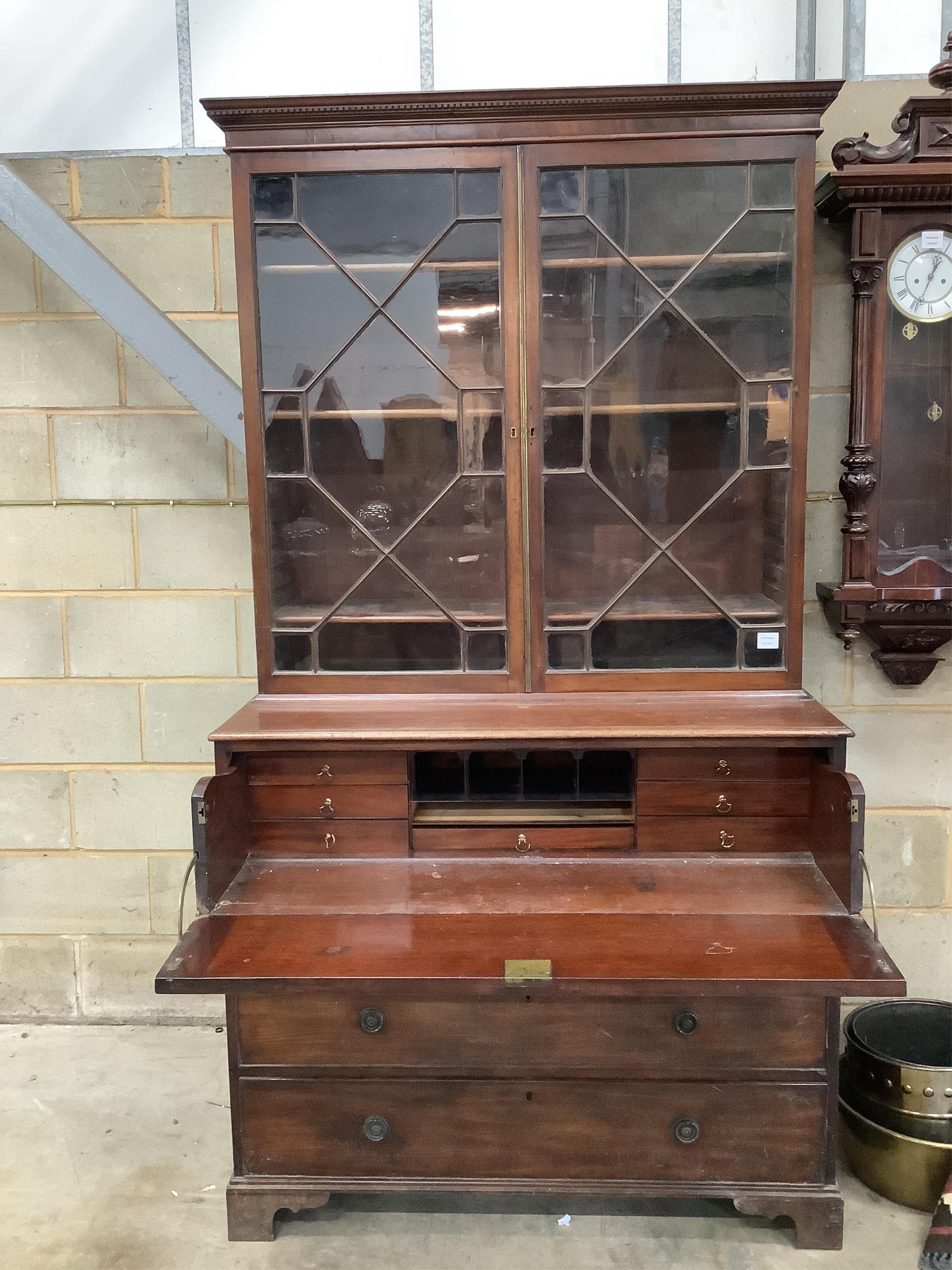 A Regency mahogany secretaire bookcase, width 116cm, depth 58cm, height 217cm. Condition - fair, two glass panes cracked